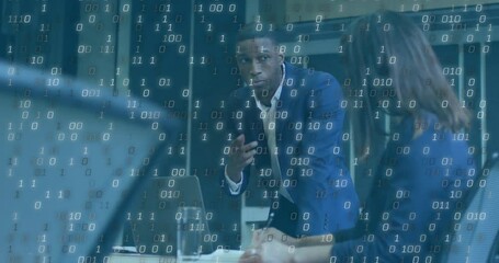 Poster - Discussing strategy, diverse professionals in business meeting with binary code overlay