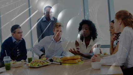 Poster - Discussing business, team having lunch with animation of abstract light patterns