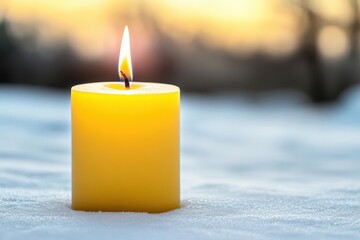 Aufkleber - Softly glowing candle sitting in a blanket of snow surrounded by a winter wonderland creating a cozy atmosphere