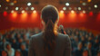 © Niams Haus - Speaker addressing audience at a conference, focused and professional, with blurred background.