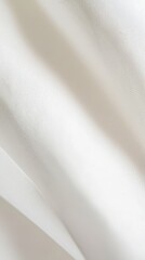 Poster - Close-Up Texture of Soft White Fabric with Gentle Draping Creases
