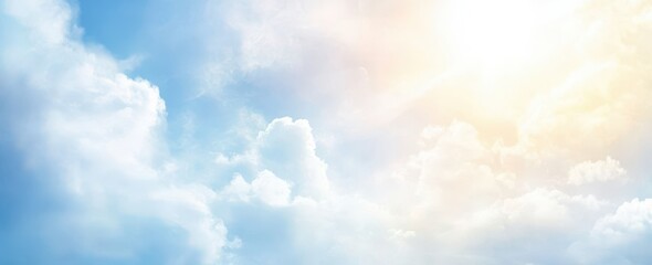 Poster - Bright and Serene Blue Sky with Soft White Clouds Illuminated by Warm Sunlight Ideal for Calm Backgrounds and Tranquil Atmospheres in Visuals