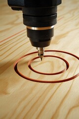 Poster - CNC Router Cutting a Perfect Circle in Wood, Precision Industrial Machinery in Action.