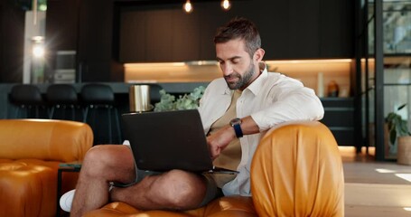 Poster - Relax, laptop and typing with man on sofa for streaming service, online review or show rating. Subscription network, search and connection with person in living room at home for entertainment website