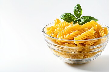Poster - Elegant bowl filled with vibrant fusilli pasta adorned with fresh basil leaves on a bright white table