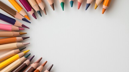 Aufkleber - A row of colored pencils are arranged in a circle on a white background