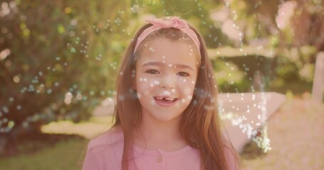 Poster - In school, girl with pink headband watching animation with digital light patterns