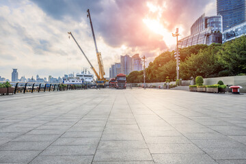 Fototapete - Empty square floor and construction site with cityscape in Shanghai