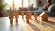 © miss irine - Wooden figures represent family house on system board. Family therapy concept with psychotherapy wooden figures, people, team, posing. Family Constellation session. Relationships between family
