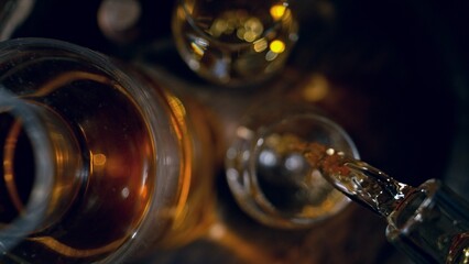 Poster - Detail of pouring whiskey into drink. Freeze motion of drink preparation.