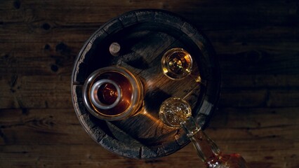 Poster - Detail of pouring whiskey into drink. Freeze motion of drink preparation.