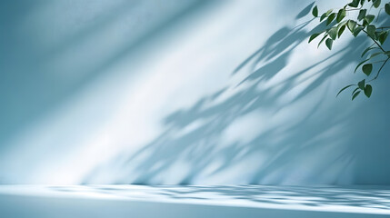 Poster - Minimalistic simple background for product presentation. Shadow from plant foliage and light on blue wall.