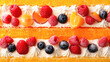 © romanets_v - Colorful berry and citrus cake with cream and fruit toppings