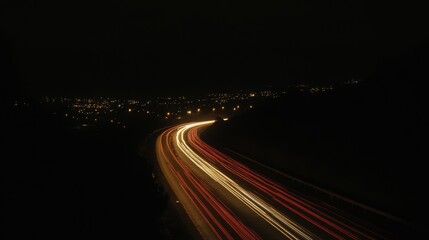 Poster - A scenic view of a bustling highway at night, with streams of car lights creating vibrant trails against the dark backdrop of a city skyline, showcasing urban transportation