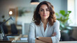 © NaphakStudio - confident female executive in modern office setting, showcasing professionalism and poise.