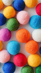 Poster - Many colorful handmade felt balls forming a beautiful and vibrant pattern, perfect for creative projects