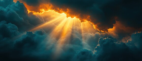 Wall Mural - Dramatic sky with sun rays piercing through dark clouds creating a celestial and ethereal atmosphere in a scenic view