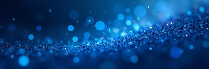 abstract blue particle background with light effects and bokeh, futuristic, particles, bokeh