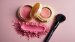 © CryptoCanvas - An open blush pack, a sample of the blush texture, and a makeup brush on a surface. Top view. Beauty and care concept.