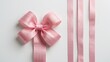 © AbstractAI - Ribbon bow in pink for gift box decoration against a white background.