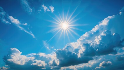 Wall Mural - Clear sky filled with white fluffy clouds and sun reflection. Bright backdrop. The summer afternoon sun illuminates a stunning sky with clouds. Warm weather, summer season.