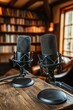 © Outkast - Two Condenser Microphones on Wooden Table in a Room with Bookshelves