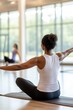 © Anna - Tranquil yoga session in sunlit studio emphasizing mindfulness and wellness