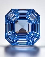 Poster - Captivating blue gemstone with emerald cut facets on reflective surface showcasing luxury and elegance for jewelry design and investment