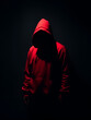 © Sean - A menacing figure in a red hoodie lurks in the shadows, casting a long, ominous silhouette on the