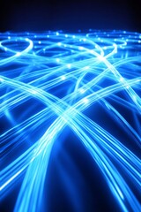 Poster - Captivating abstract image showcasing dynamic blue light trails on a dark background. The glowing lines create a mesmerizing pattern, perfect for digital art themes.