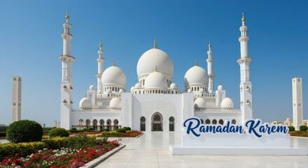 Aufkleber - A stunning mosque set against a clear blue sky with multiple domes including a large central dome and two tall minarets there is a sign with the text Ramadan Kareem written in blue elegant font