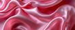 © Phuwameth - Elegant abstract three-dimensional pink rose silk and satin fabric with luxurious velvet texture creates a smooth backdrop for weddings or artistic projects in silky waves.