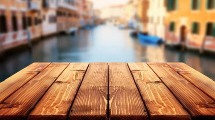 Fototapete - A rustic wooden tabletop sets the scene, with a hazy view of a canal, perfect for showcasing your products.