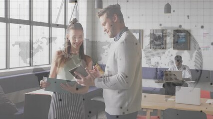 Poster - Discussing documents, business professionals with animated world map overlay in office