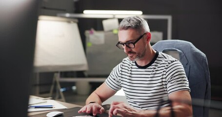 Poster - Business, creative and man with computer, glasses and copywriter with ideas for project and article. Typing, copywriting and mature person with tech for blog, contemplating and thoughtful for task