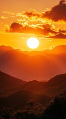Poster - Golden sunlight gracefully descends behind a range of mountains, flooding the landscape with orange and red tones. The evening air is calm and serene, perfect for contemplation