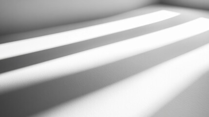 Poster - Soft morning light filters through a window, casting delicate shadows across a smooth surface. The interplay of light and shadow creates a calming atmosphere in the room