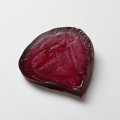 Poster - Sliced roasted beet showcasing deep red color with glossy surface and natural texture on a clean background