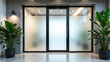 © PRODPLEUM DESIGN - Modern Glass Entrance with Lush Greenery