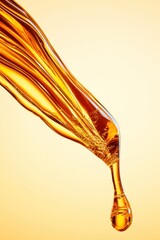 Aufkleber - Golden liquid dripping from a smooth surface against a warm background