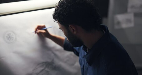 Poster - Man, drawing and design for car in studio, inspiration and editing process for deadline at night. Person, paper and technical sketch for electric vehicle, transport and back in workshop at company