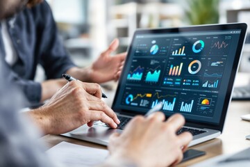 Poster - Business team analyzing financial data on laptop in modern office.