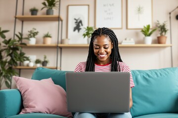Aufkleber - Woman working on laptop in cozy home office with plants.