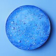 © Nurul - Circular, gel-like, cosmetic disc, with blue, watery texture, and glitter