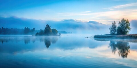 Aufkleber - A serene lake mirroring the soft hues of a misty dawn with distant trees and a gentle breeze