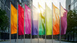 © Arda - Vibrant Multicolored Flags Waving in the Sunlight in Front of Modern City Buildings at Sunset