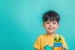 © JK_kyoto - Young Boy Smiling with Colorful Building Blocks in a Creative Playful Environment