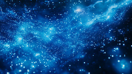 Poster - Abstract blue background with sparkling particles, resembling a galaxy or cosmic nebula, creating a dreamy and magical atmosphere, ideal for design projects