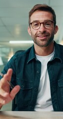 Fototapete - Face, video call and business man with greeting in startup for training, online meeting or virtual conference. Webinar, talk and happy creative worker in office for feedback or writing notes in pov