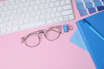 Aufkleber - Designer's workplace with keyboard and stationery on pink background, flat lay. Space for text
